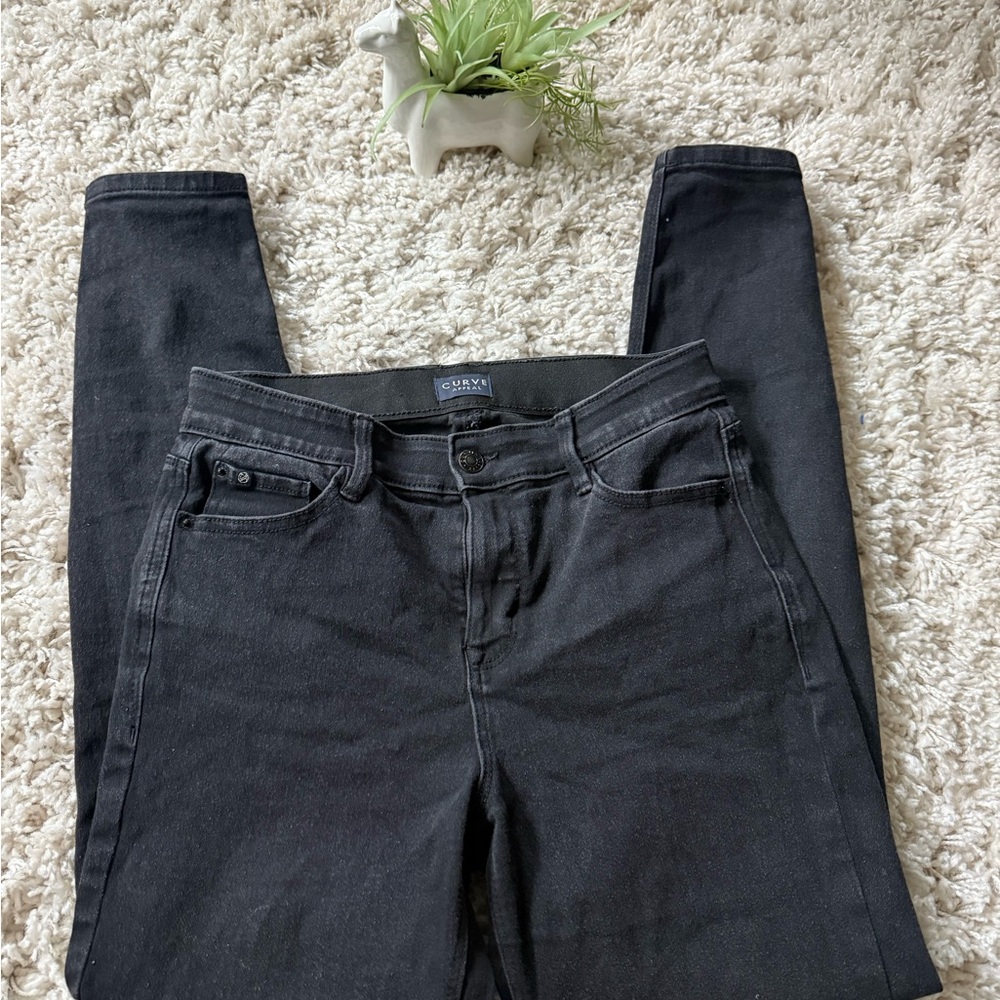 Black Skinny Jeans with Smooth Texture and Full Length